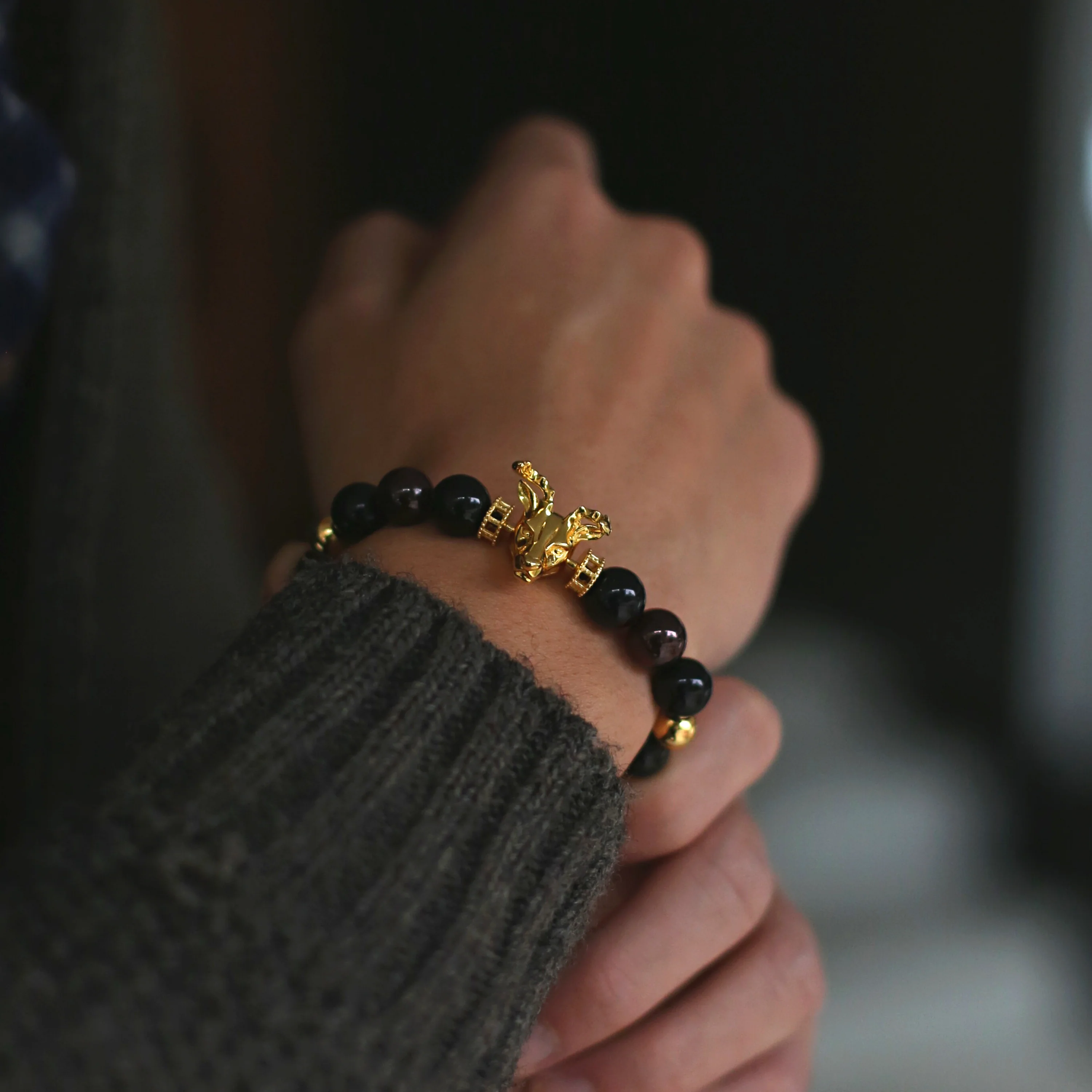 Gold Deer, obsidian, garnet bracelet with gold connector - Image 3
